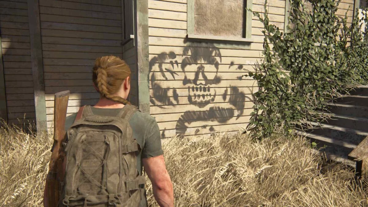 Abby entdeckt in The Last of Us 2 seltsame Graffitis.