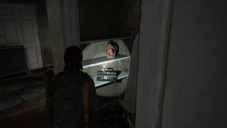 Upgrade-Teile im Wäscheraum des Apartments neben dem Capitol Inn in The Last of Us 2.