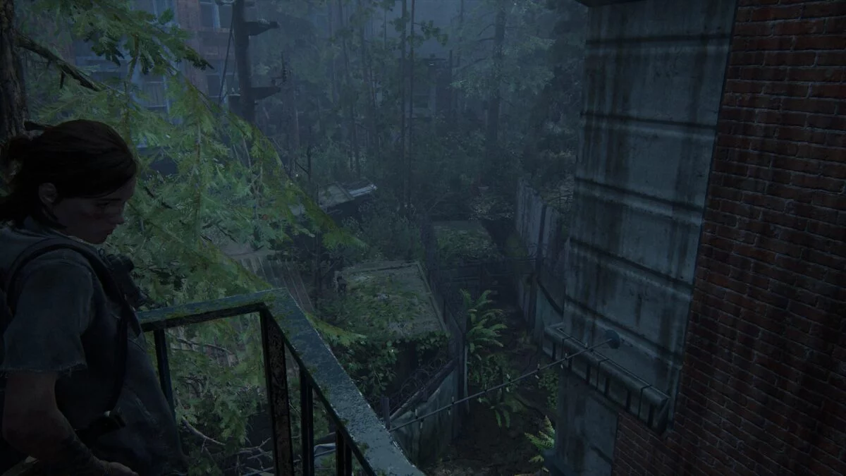 Ellie steht auf einem Balkon, unter ihr liegt die Engstelle in einen Bereich voller Scars in The Last of Us 2