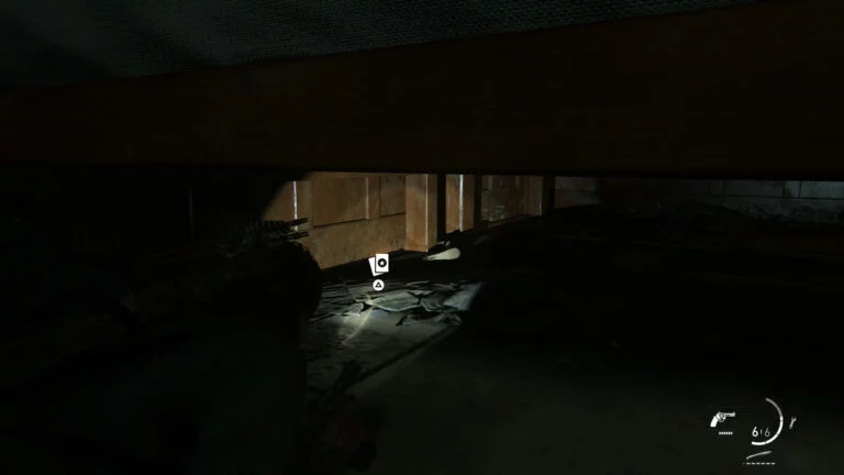 Sammelkarte Reverb liegt unter einem Bett versteckt in The Last of Us 2.