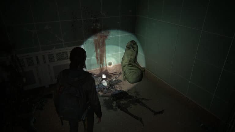 Auf einem Skelett neben einem Seesack liegt das Artefakt Bitte an einen Freund in The Last of Us 2