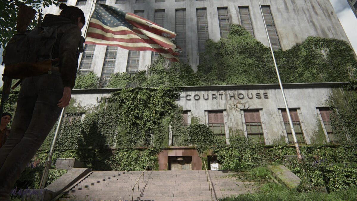 Ellie at the bottom of the stairs of the courthouse.