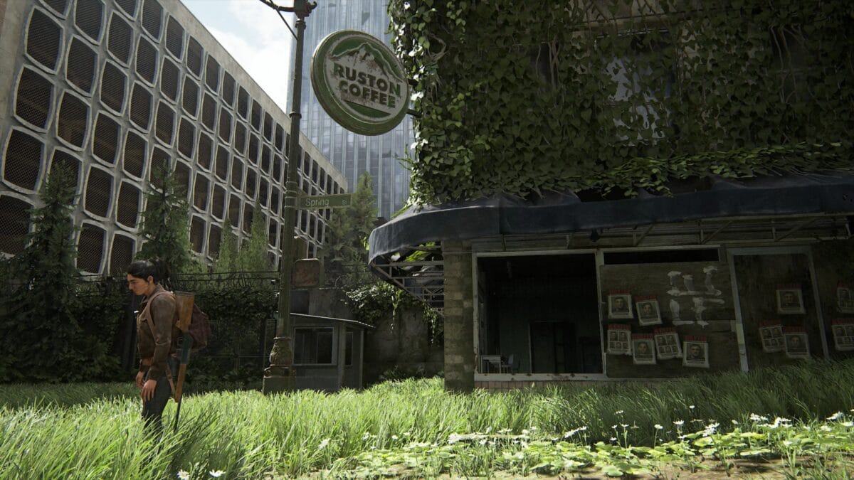 Ellie looks at the Ruston Coffe Shop in Seattle Center in The Last of Us 2