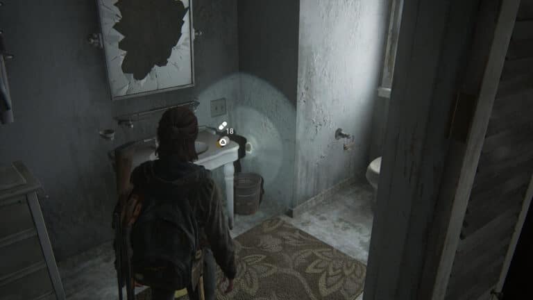 Zusätze auf der Ecke des Waschtischs unter dem zerstörten Spiegel des Badezimmers im Serevena-Hotel in The Last of Us 2