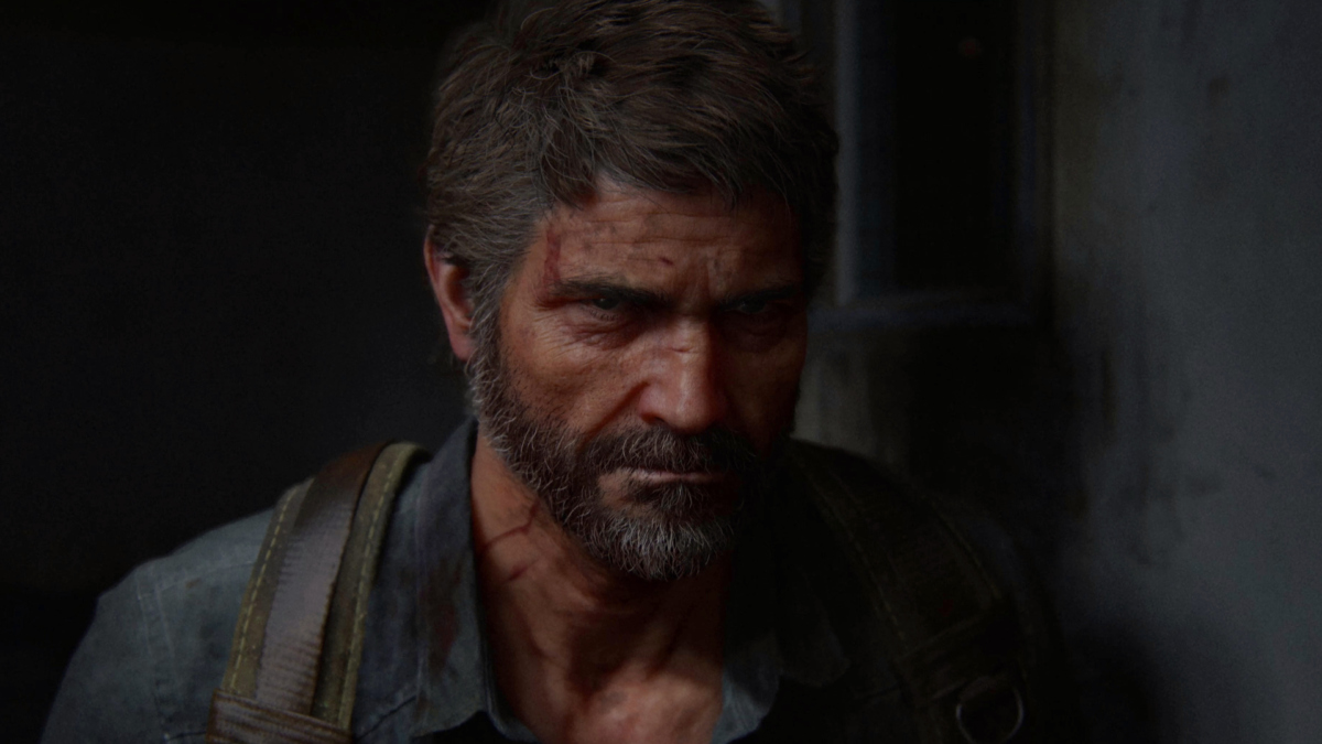 Eine Szene aus The Last of Us Part 2 Remastered zeigt einen Mann mit dunklen Haaren und Vollbart mit wütendem Blick.