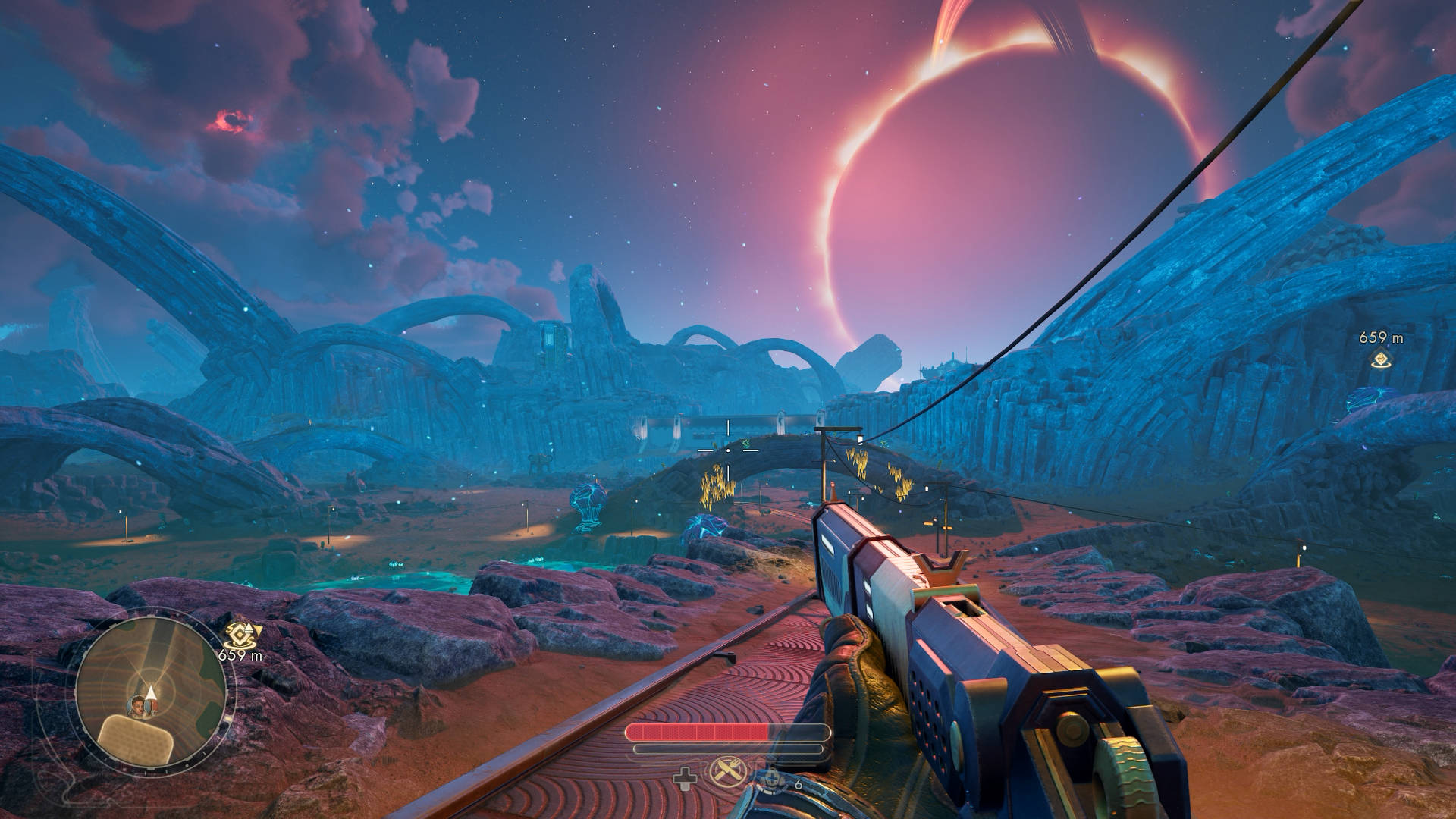 First-person view over a glowing blue alien landscape with bizarre rock arches and a massive planet looming in the sky — gameplay scene from The Outer Worlds 2.