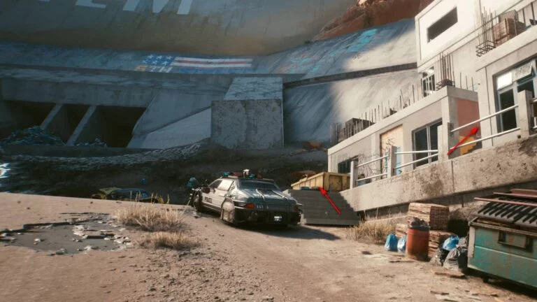 Cyberpunk 2077 Kleidung-Guide Geparkter Polizeiwagen neben Treppe zu einem Slum-Gebäude