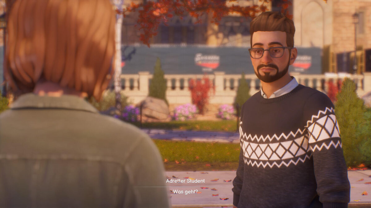 Ein Student in Wollpulli, daneben Max.