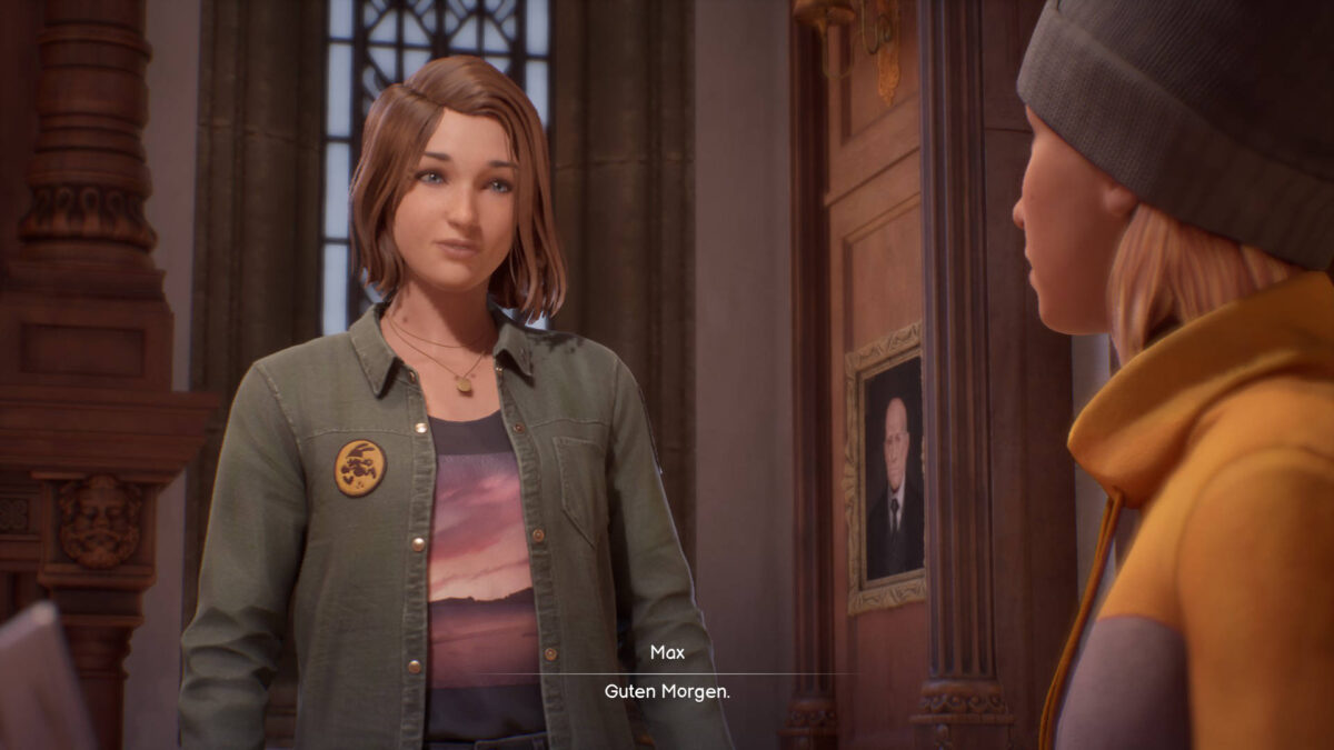 Max steht in der Bibliothek vor Loretta.