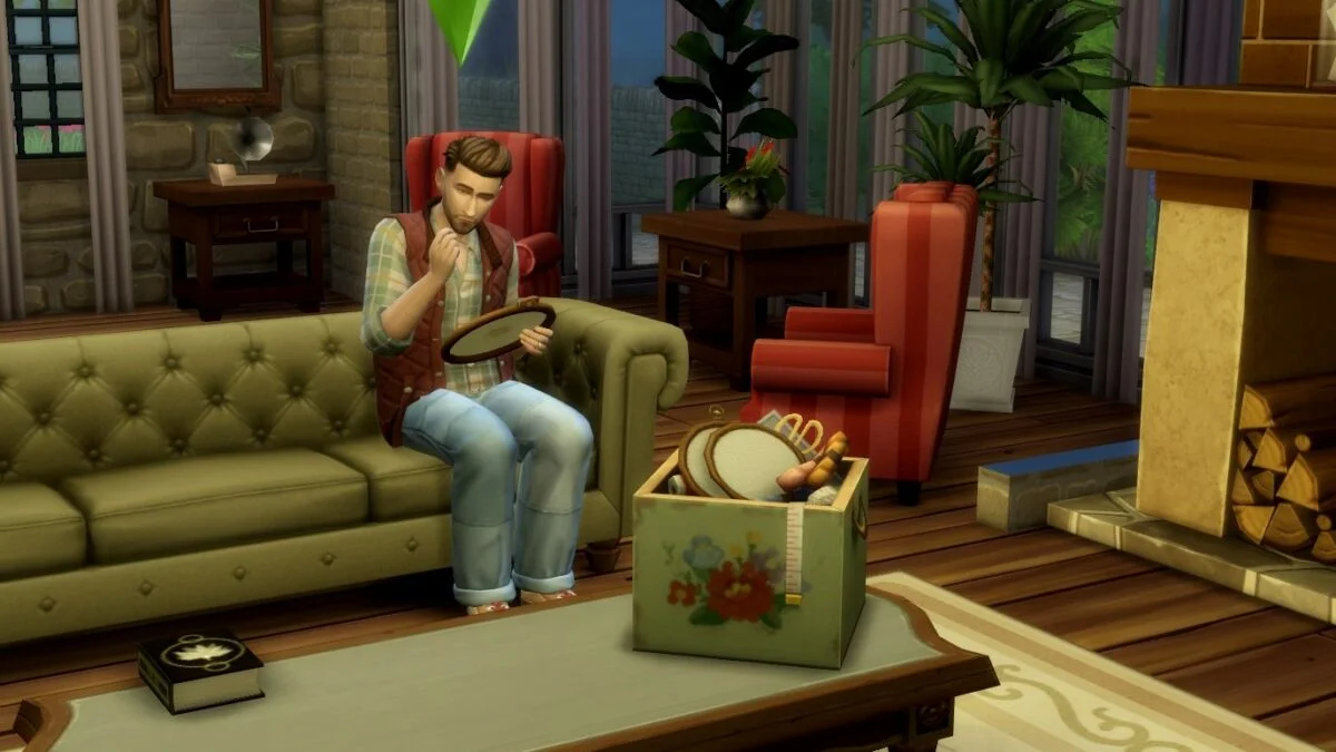 Sims 4 Landhaus-Leben Guide Sim sitzt auf Sofa und stickt in Rahmen