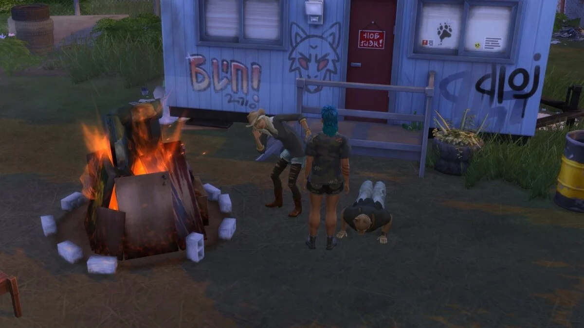 Sims 4 Werwölfe drei Sims bei brennendem Lagerfeuer vor einem besprayten Bauhauscontainer